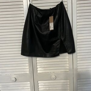 Brand new faux leather mini skirt with slit